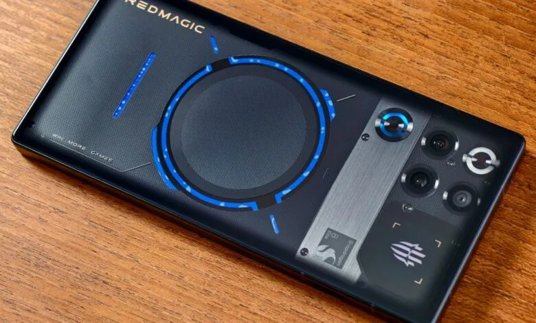 Close-up of the back of a black RedMagic gaming smartphone with blue accents.