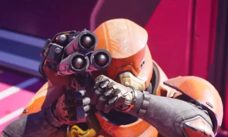 Orange armored figure aiming a triple-barreled weapon.