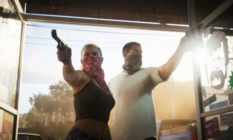Two individuals wearing bandanas over their faces, one holding a handgun, stand in a doorway.
