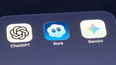 Close-up of a smartphone screen displaying app icons for ChatGPT, Sora, and Gemini.