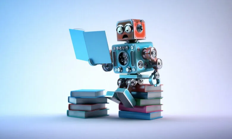 A retro-style robot with wide eyes sits on a stack of books, reading another book.