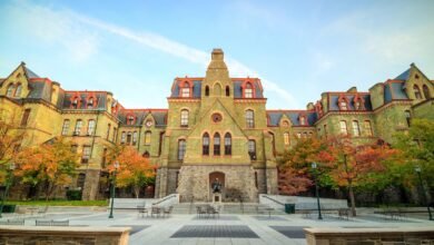 University of Pennsylvania's historic College Hall building with autumn foliage.