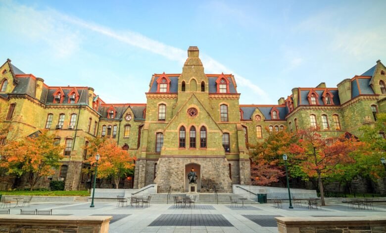 University of Pennsylvania's historic College Hall building with autumn foliage.
