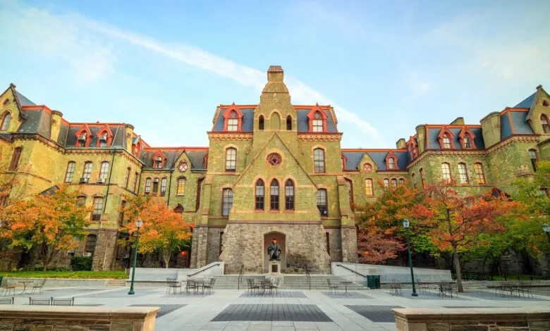 University of Pennsylvania's historic College Hall building with autumn foliage.