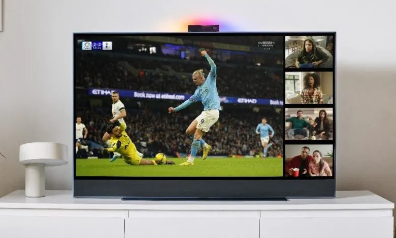 A modern television displaying a soccer match with multiple viewing windows.