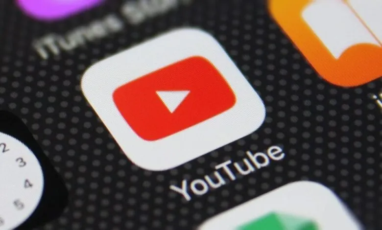 Close-up of the YouTube app icon on a smartphone screen.