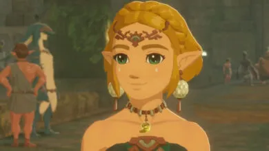 Princess Zelda with blonde hair and green eyes, wearing a tiara and necklace.