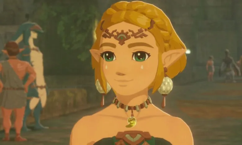 Princess Zelda with blonde hair and green eyes, wearing a tiara and necklace.