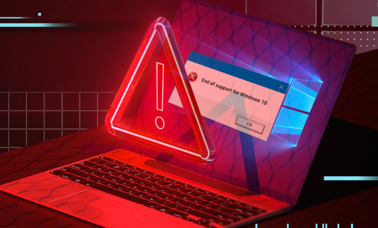 Laptop screen displays 'End of support for Windows 10' error message.