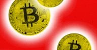 Three Bitcoin symbols on a red background with a white glow around each coin.