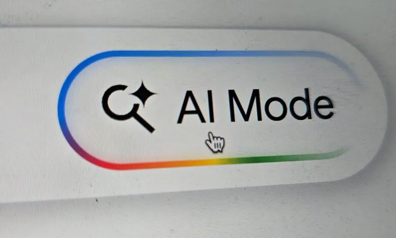 AI Mode button on a screen with a magnifying glass icon.