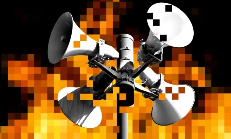Four loudspeakers on a pole against a pixelated orange and black background.