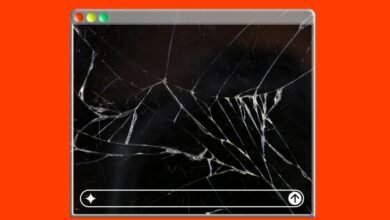 Cracked screen of a computer window on a bright orange background.
