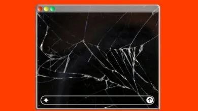 Cracked screen of a computer window on a bright orange background.