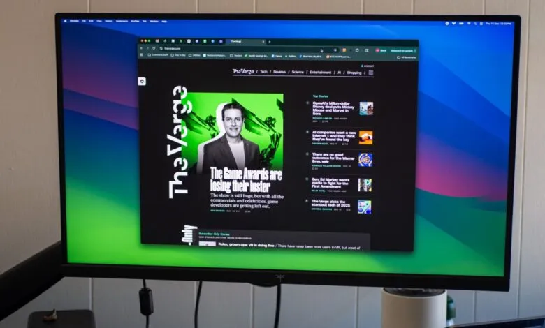KTC H27P3 monitor displaying The Verge website on a colorful desktop.