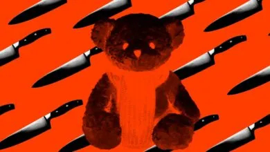 Teddy bear with knives in the background, creating a disturbing image.