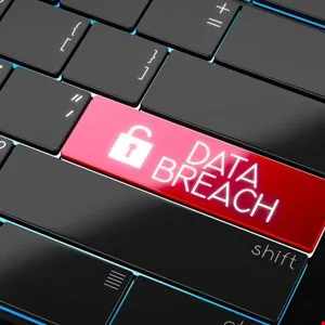 Keyboard with a red 'Data Breach' key and a padlock icon.