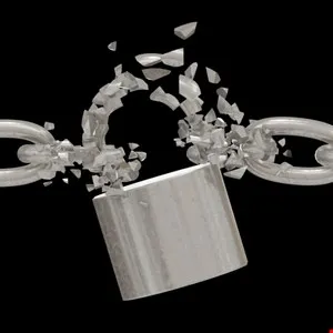 Broken silver chain with shattered links against a black background.