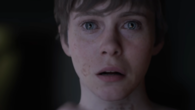 Close-up of Sophia Lillis with a worried expression and marks on her face.