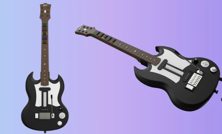 Gibson Guitar Hero controller with colorful fret buttons.
