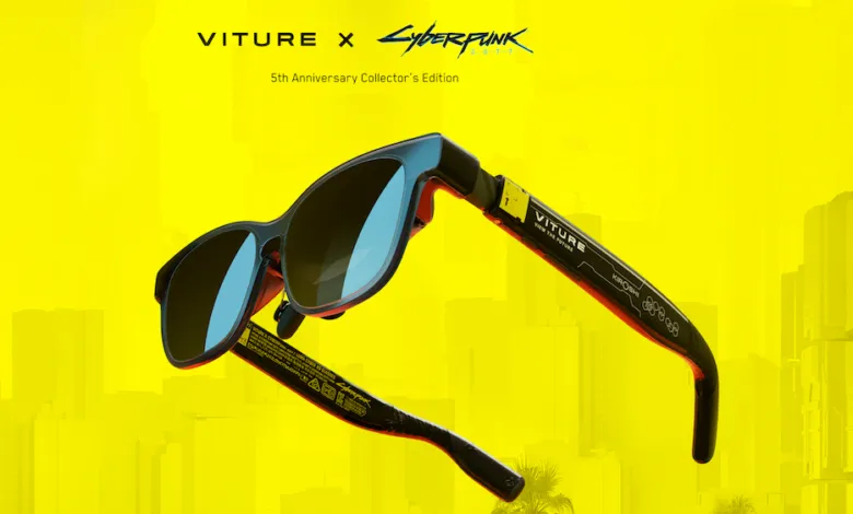 Viture x Cyberpunk 2077 5th Anniversary Collector's Edition XR glasses on yellow background.