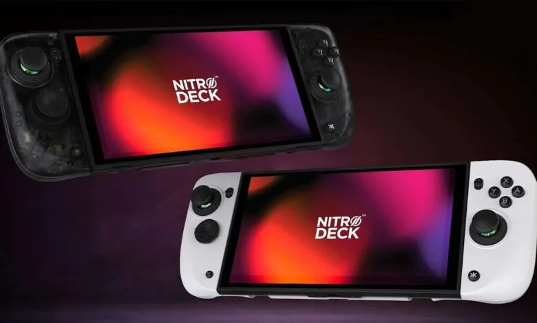 Two Nitro Deck handheld gaming consoles, one black and one white, floating against a dark background.