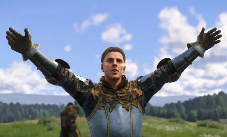 Man in medieval armor with arms raised against a blue sky.