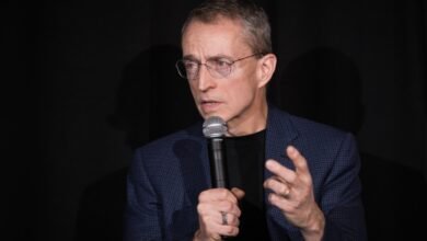 Pat Gelsinger speaking into a microphone at an event.