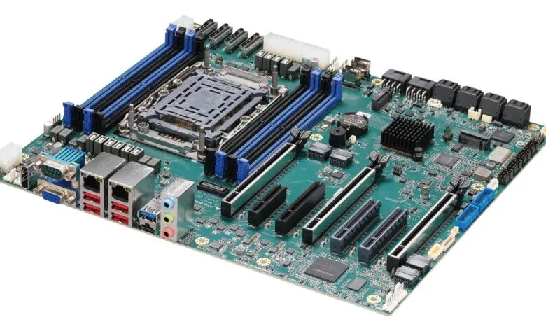 Close-up of a green computer motherboard with various components.