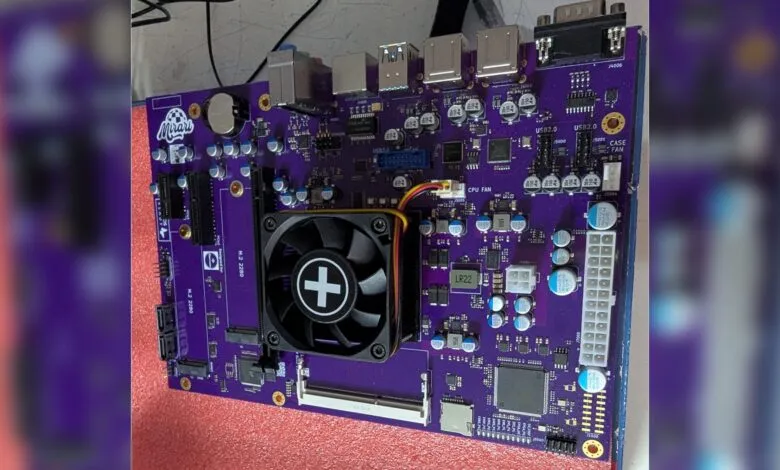 Purple Mirari motherboard with CPU fan and various ports.