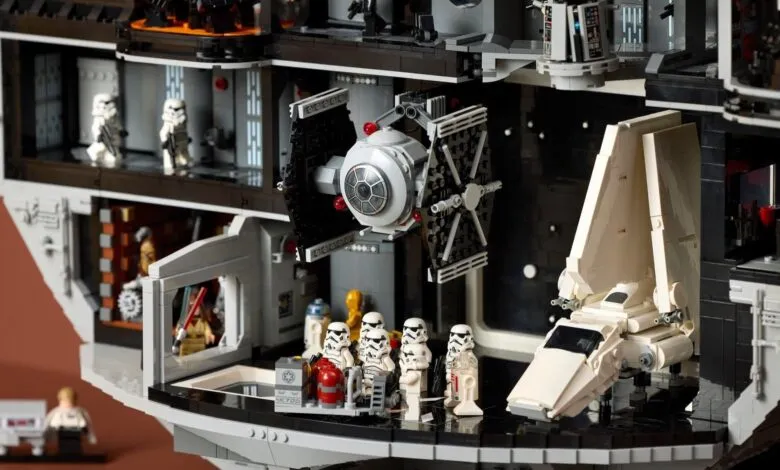 Detailed LEGO Death Star model featuring Stormtroopers, TIE fighter, and shuttle.