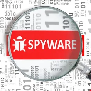 Magnifying glass focuses on 'SPYWARE' text with a bug icon on a red background.