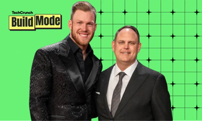 Kyle Rudolph and Jon Walburg pose together against a bright green backdrop.