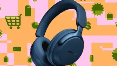 Blue Bose headphones on a colorful shopping-themed background.