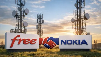 Free and Nokia logos shake hands in front of cell towers.
