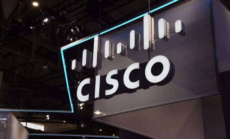 Illuminated Cisco logo with soundwave graphic at a trade show booth.