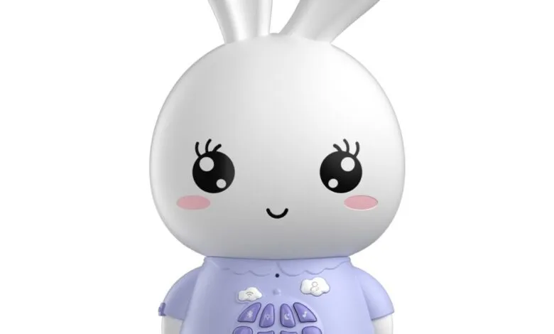 Cute white bunny night light with kawaii-style face and purple shirt.