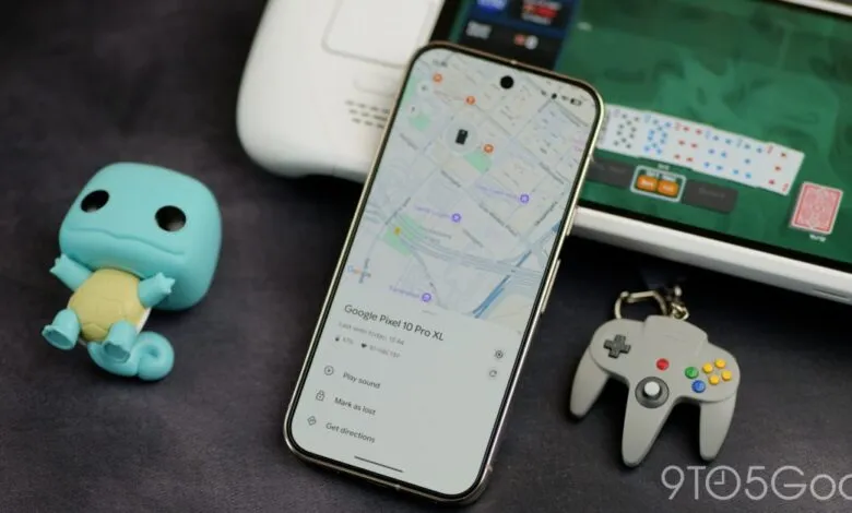 Google Pixel 10 Pro XL showing map, next to Steam Deck, Squirtle figure, and N64 controller keychain.