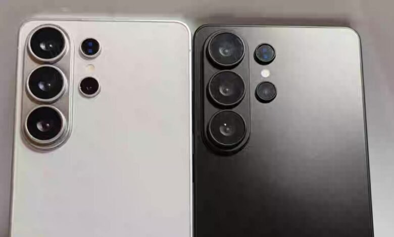Close-up of white and black smartphones showing camera lens array.