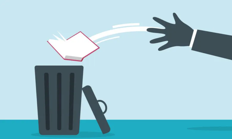 Hand throws open book into trash can, symbolizing rejection of knowledge.