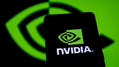 Nvidia logo displayed on a smartphone screen with background logo.