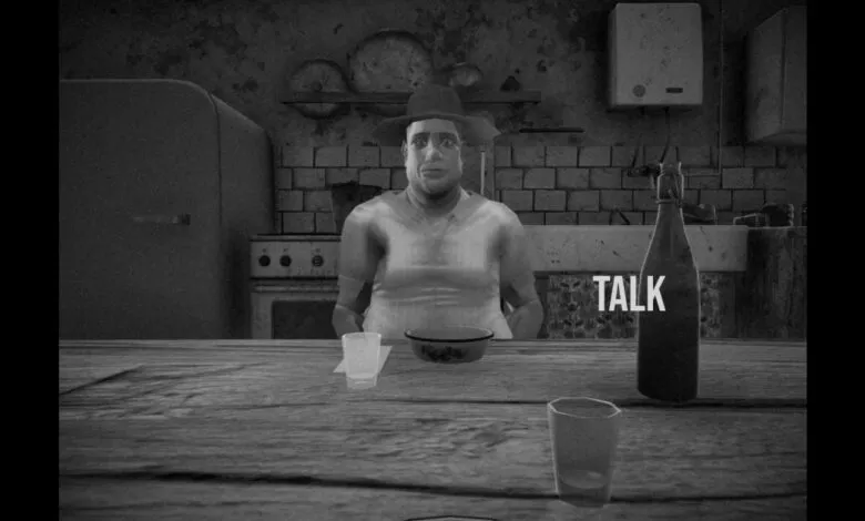 Black and white scene shows a man at a table with a bottle labeled 'TALK'.