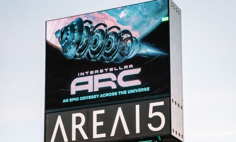 Area15 sign displaying 'Interstellar Arc' with space imagery.
