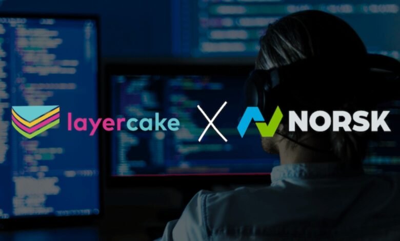 LayerCake and Norsk logos with a developer coding in the background.