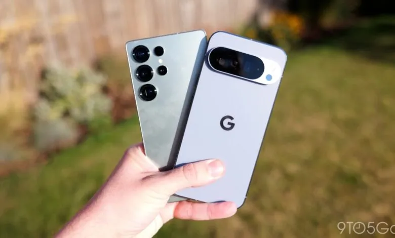 Hand holding Samsung Galaxy S23 Ultra and Google Pixel 7 Pro phones.