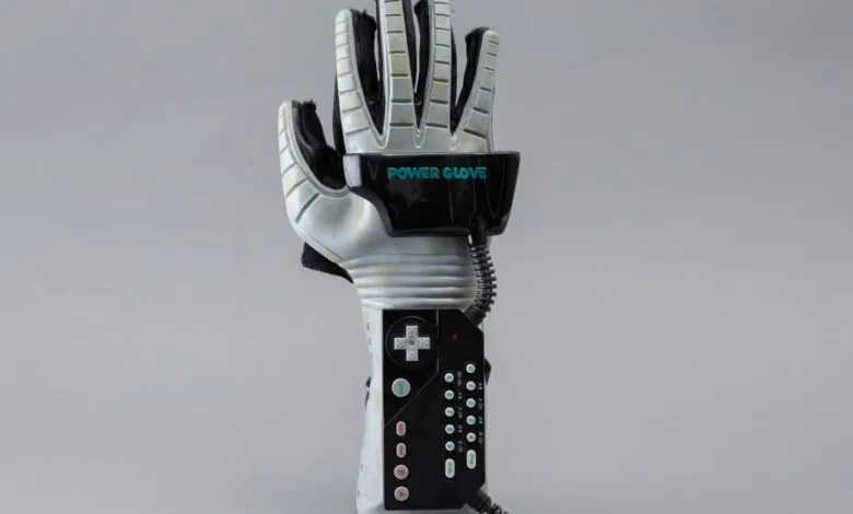 Nintendo Power Glove: a vintage gaming accessory with controller buttons.