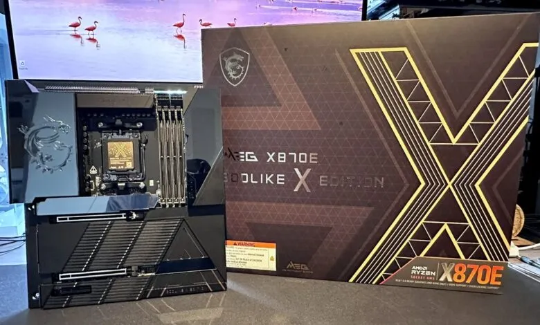 MSI MEG X870E Godlike X Edition motherboard and box, black and gold design.