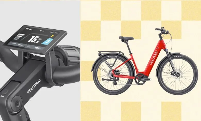 Velotric Discover 2 e-bike with display showing speed and battery life.