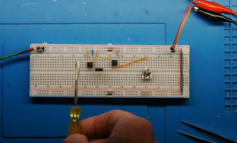Electronics project on breadboard with wires and components.