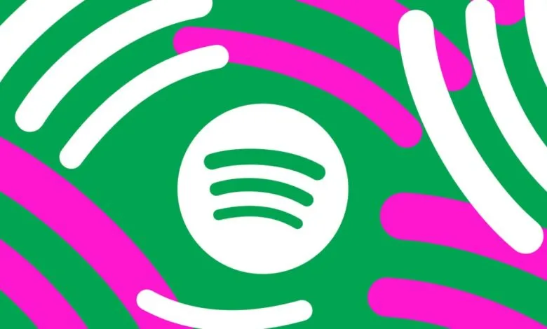 Spotify logo on green background with pink and white curved lines.